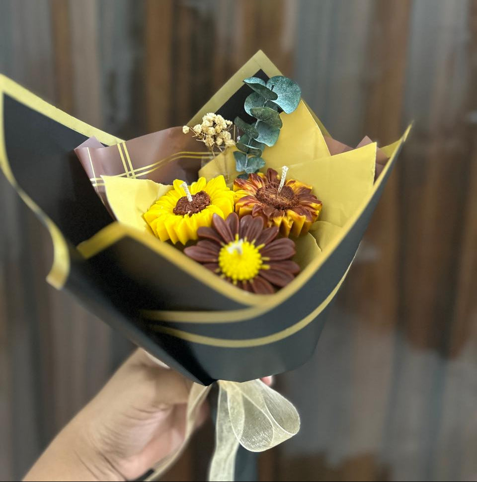 Bouquet of flowers wrapped in black paper with a blurred background